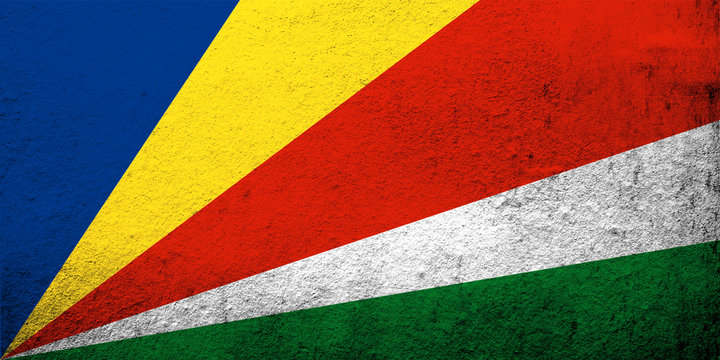 The Republic of Seychelles National flag. Grunge background © Chernobrovin