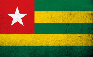 The Togolese Republic (Togo) National flag. Grunge background