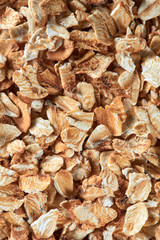 Uncooked oat flakes as a background. Close up, top view, high resolution product. Healthy food Concept.