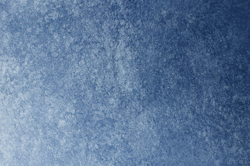 Venetian blue wall cement paint texture background.