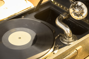 Gramophone with vinyl record close-up