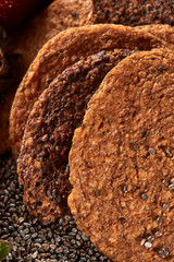Homemade natural crackers from organic ingredients with chia seeds. Close-up view.
