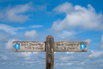 A Signpost on the South Downs Way between the Clayton windmills and Ditchling Beacon indicating the direction of the footpath.