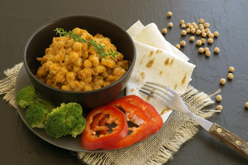 Turkish chickpeas stewed in spicy sauce. Oriental dish.