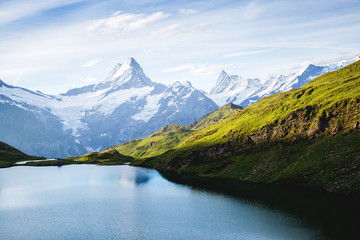 Great view of the snow rocky massif. Location Bachalpsee in Swiss alps, Grindelwald valley.