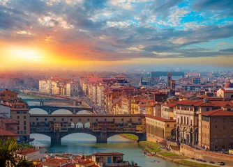 Keuken foto achterwand Ponte Vecchio Ponte Vecchio over de rivier de Arno bij zonsondergang in Florence, Italië