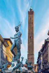 The Neptune Fountain in Piazza del Nettuno - Torre degli Asinelli tower Bologna, Italy - obrazy, fototapety, plakaty
