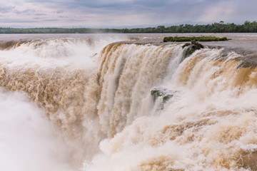 Breathtaking view of the Devils throat in Iguazu waterfall roaring