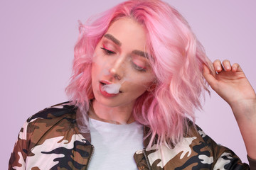 Young smoking hipster woman