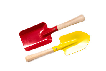 Children's scoop tools for working in the garden isolated on white
