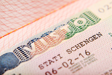 Obraz premium Italian Schengen visa in a passport
