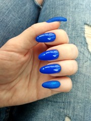hands  manicure. blue nails