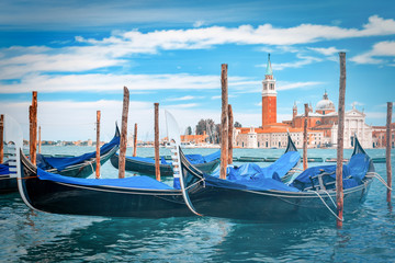 Fototapeta na wymiar Gondolas at the Grand Canal in Venice, Italy