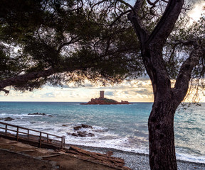 Fototapeta na wymiar castle island on Mediterranean sea shore in winter