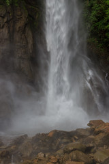 Waterfall on the cascade road in banos, ecuador