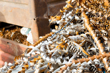 silver spirals of metal shavings as garbage, texture of different size of metal spirals shavings texture, metal shavings texture