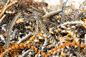 silver spirals of metal shavings as garbage, texture of different size of metal spirals shavings texture, metal shavings texture