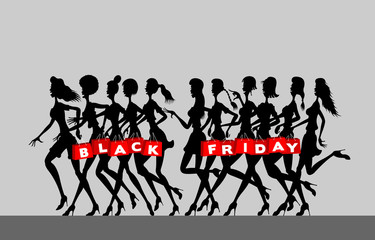 Women silhouettes with holding black friday shopping bags