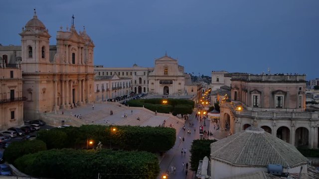 Architecture of Noto, Sicily -  Italy. Evening in the city full of tourists.