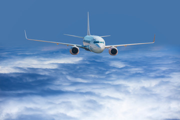 Passenger airplane in the clouds. travel by air transport