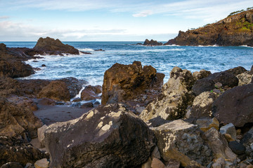 Seascape with waves crashing on the rocks in Seixal, Madeira