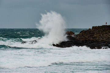 waves crashing on the rocks