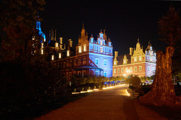 New Castle in the park Muskauer at night in Germany.