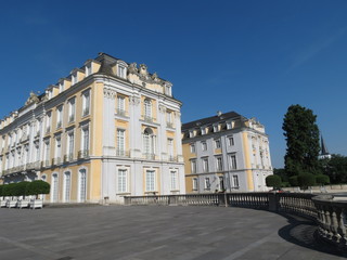 Fototapeta na wymiar Yellow and white Baroque style palace in Bruhl, Rhineland, Germany, summer