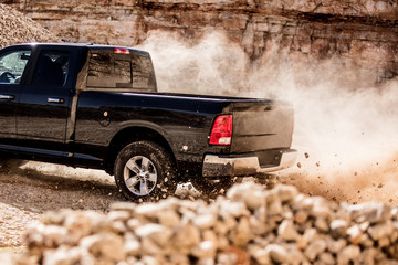 Fast driving truck in a rock quarry