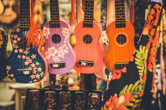 Fototapeta Colorful ukeleles in a hawaiian shop