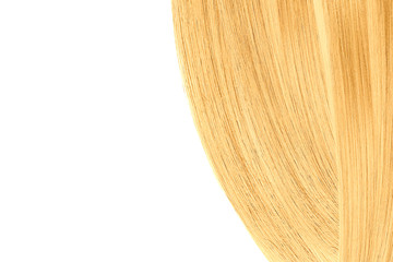 Blond (gold) hair, isolated on white background. Flat lay and copy space
