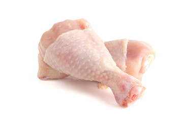 Two chicken legs close-up. Raw chicken legs isolated on white background.