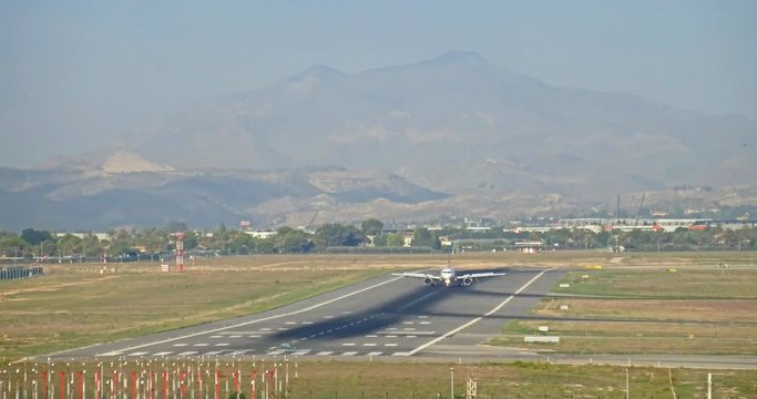 The busy runway at Alicante airport, Spain (ALC). A few Easyjet aircrafts followed by a British Airways one. TIMELAPSE.
