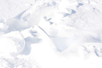Fototapeta na wymiar Background. Small clumps of white snow