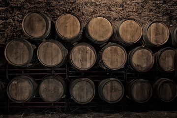 Wine cellar interior with large wooden barrels