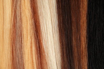 Colorful hair strands, top view. Professional care