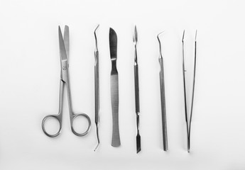 Dentist's tools on white background