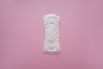 Menstrual pad on color background