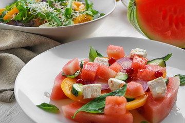 Delicious watermelon salad on plate, closeup