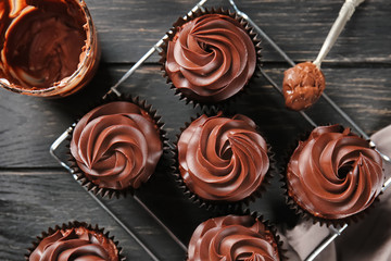 Delicious chocolate cupcakes on cooling rack