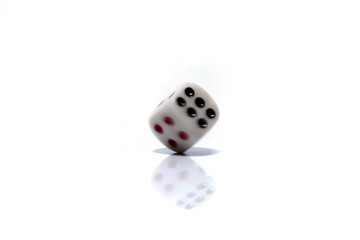 Rolling White dice isolated on white background