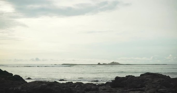 Wide shot of Caribbean sea and clouds from rugged coastline