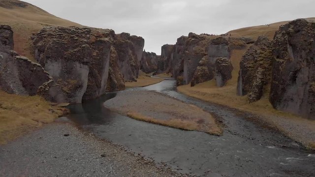 Cinematic aerial fly through of stunning Icelandic canyon.