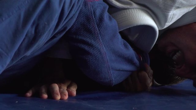 Slow motion jiu jitsu roll