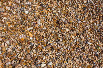 Rocks and Stone beach pattern closeup, Summer seacoast background