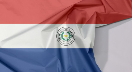 Paraguay fabric flag crepe and crease with white space, a horizontal triband of red, white and...