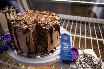 Blue ribbon winning chocolate cake at county fair