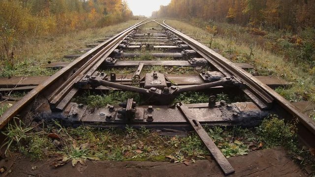Railway switch is moving from one track to another. Choose the right path