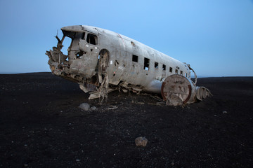 Fototapeta na wymiar Plane Wreck accident on black sand beach in Iceland