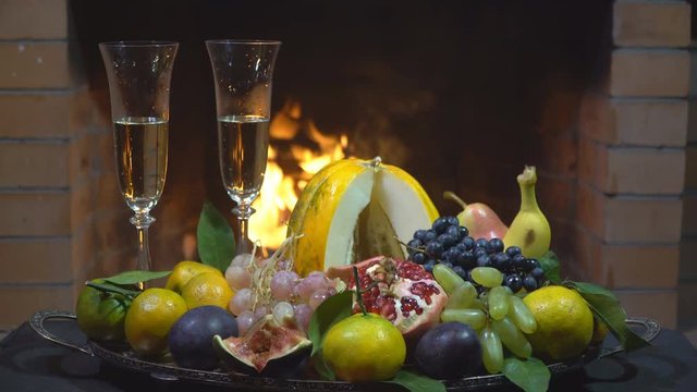 still life with champagne on fire background, dolly shot